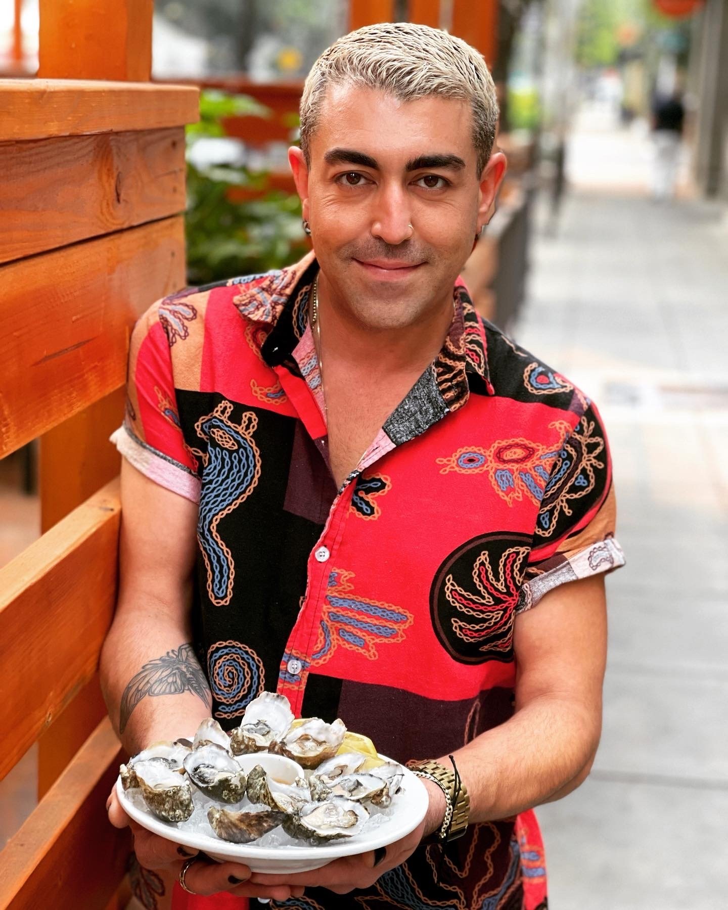 Demetri Gregorakis serving Oysters at The Rind